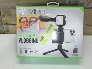 lot 14 image: Digipower - Follow ME Vlogging Kit for Phones and Cameras  Includes Microphone, LED light, Bluetooth remote, phone grip and tripod