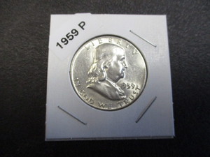 1959-P Franklin Silver Half Dollar woriginal mint luster and cartwheel effect.