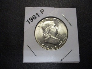 1961-P Franklin Silver Half Dollar woriginal mint luster and cartwheel effect.