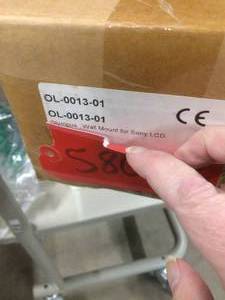 lot 20 image: New In Box Olympus LCD Wall Mount Bracket