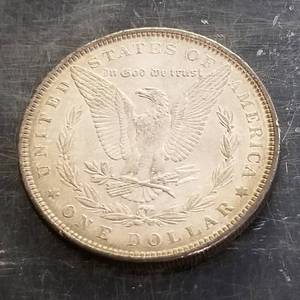 1889 MORGAN SILVER DOLLAR AU