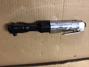lot 7 image: Milwaukee M12 FUEL Cordless Brushless 38in. Ratchet  Tool Only, Model# 2557-20 Customer Returns See Pictures