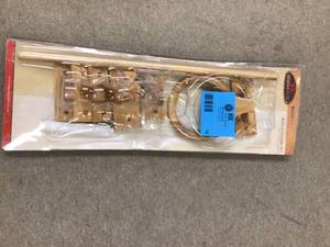 lot 18 image: Dalton 4-Piece Bathroom Hardware Kit in Honey Oak Customer Returns See Pictures