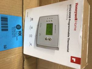 lot 32 image: Honeywell Home 5-2 Day Programmable Thermostat with Digital Backlit Display Customer Returns See Pictures