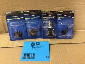 lot 43 image: Calterm Illuminated 12-Volt DC20 Amp Rocker Switch, Red Customer Returns See Pictures