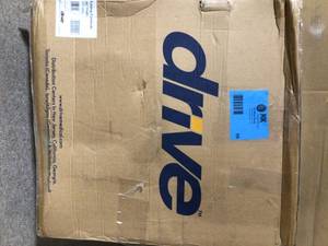lot 59 image: Drive Medical Folding Steel Bedside Commode Customer Returns See Pictures