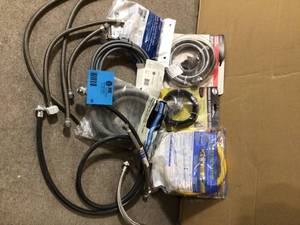 lot 68 image: MIX LOT OF KITCHEN SPRAY HOSE AND MISC Customer Returns See Pictures
