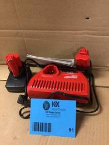 lot 91 image: Milwaukee M12 12-Volt Lithium-Ion 4.0 Ah and 2.0 Ah Battery Packs and Charger Starter Kit Customer Returns See Pictures