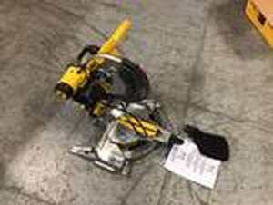 lot 107 image: 15 Amp Corded 12 in. Compound Double Bevel Miter Saw by DEWALT Customer Returns See Pictures