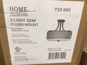 lot 58 image: Home Decorators Collection 3-Light Bronze Mesh Pendant with Inner Cream Fabric Shade Customer Returns See Pictures