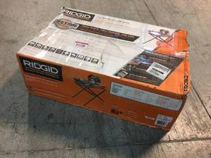 lot 105 image: 9 Amp Corded 7 in. Wet Tile Saw with Stand by RIDGID Customer Returns See Pictures