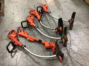 Lot of 4 14 in. 7.5-Amp Corded Electric Curved Shaft High Performance Single Line 2-in-1 String Grass TrimmerLawn Edger by BLACKDECKER Customer Returns See Pictures