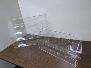 lot 402 image: Lot of Two Acrylic Display Stands, Deco Pack, Inc.