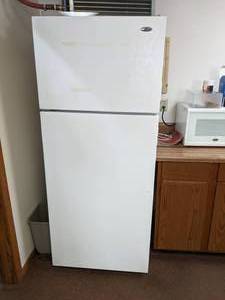 lot 20 image: White Amana Refrigerator