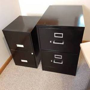 2- 2 drawer filing cabinets 1 large...