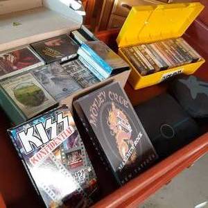 Cassette tapes, 2 VHS tapes, and CD...