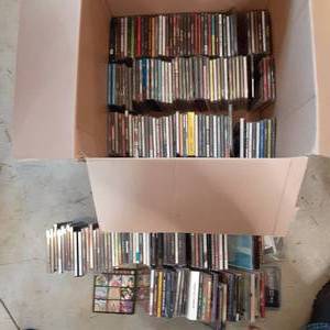 Box of CDs including Bon Jovi, Link...