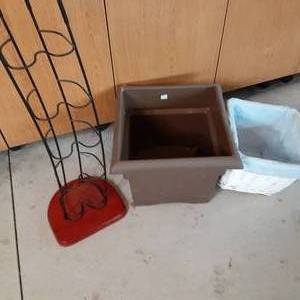 CD tower, cloth lined wicker basket...
