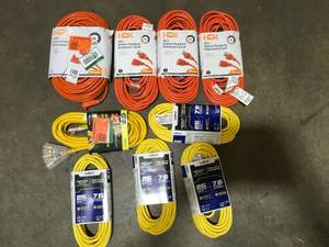 Lot of assorted outdoorindoor extension cords various sizes not used see pictures