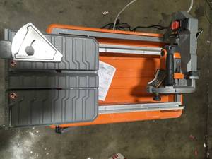 RIDGID 9 Amp Corded 7 in. Wet Tile Saw with Stand open box customer return in good condition see pictures