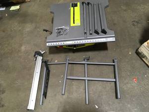 Ryobi 15 Amp 10 in. Table Saw with Folding Stand open box customer returns see Pictures