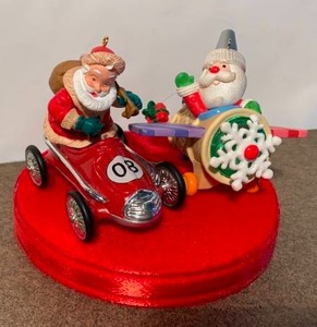 lot 145 image: Hallmark Santa Ornaments