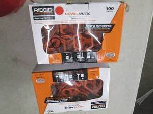 2 boxes of rigid level max tile spa...