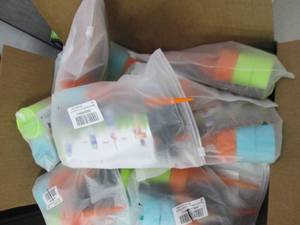 box full of watering devices for pla...
