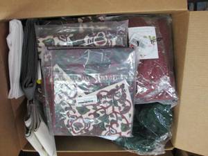 box of curtains, duvets and other m...