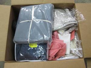 box of curtains, duvets and other m...
