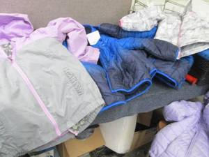lot 340 image: Box of Kids Coats- most need new zi...