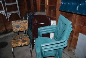Lot of misc chairs and a cot. Indoo...