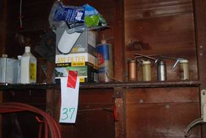 shelf of contents including small v...