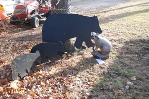 3 Wooden bear silhouettes and a pla...