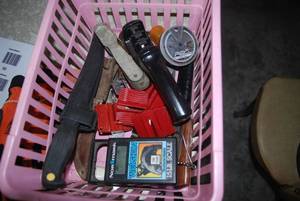 5 gallon bucket with fishing rods a...