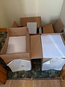 Cases of blank reams of white paper...