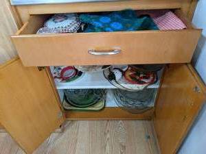 Drawer of hot pads and place settin...