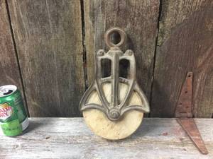 lot 71 image: Antique Cast IronWood Barn Pulley