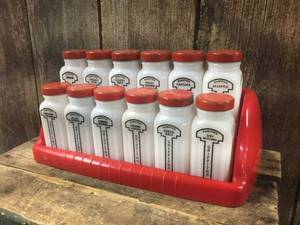 lot 20 image: Vintage Griffiths Milk Glass Spice Skaker Set