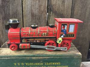 lot 48 image: Vintage Trade Mark Modern Toys Battery Op Tin Train