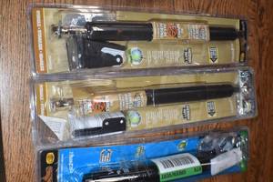 Storm door closers