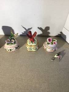 3 heritage house music boxes one of the birds is broke off.