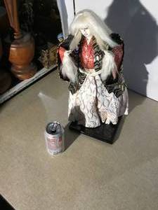 Vintage Japanese doll in multi color dress with white hair