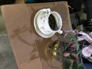 2 flower pots 1 brass and 1 ceramic