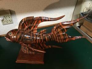 Vintage wooden fish hand made with ship in belly.