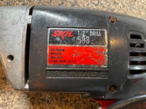 lot 126 image: Skil 12 Inch Drill with Bits and a Case