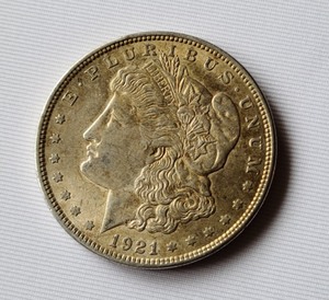 lot 22 image: Three 1921 Morgan Silver Dollars