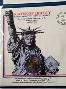 lot 26 image: Commemorative Statue of Liberty Stamp and Half Dollar