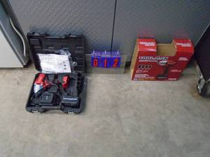 New Toolman 20 volt 12 impact qwith battery & charger. Was a show display. As shown.