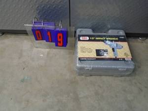New 12 110 v olt impact wrench. New in box. Was a show display. As shown.